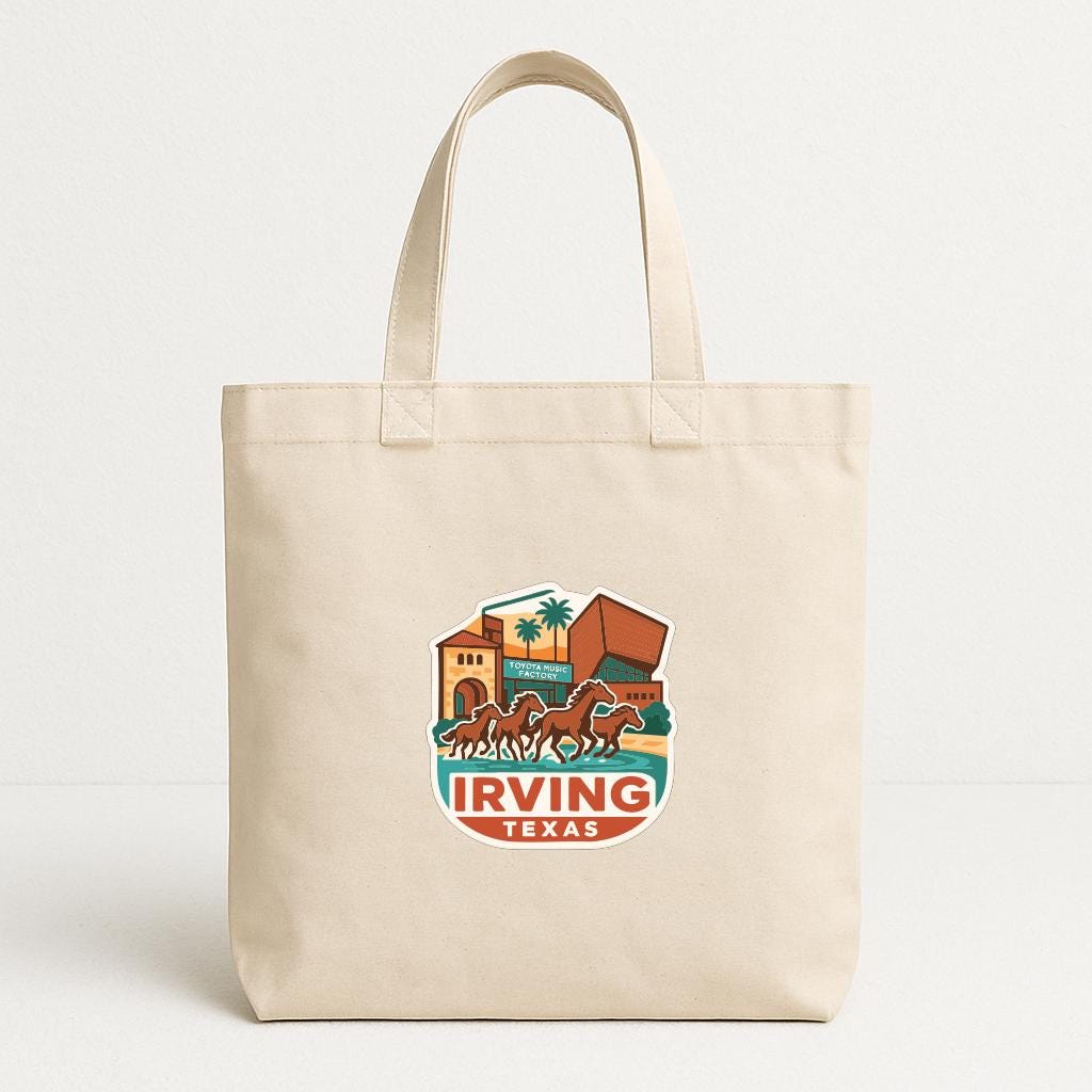 A beige tote bag with a printed design featuring a cityscape and the text "IRVING TEXAS" printed on it.