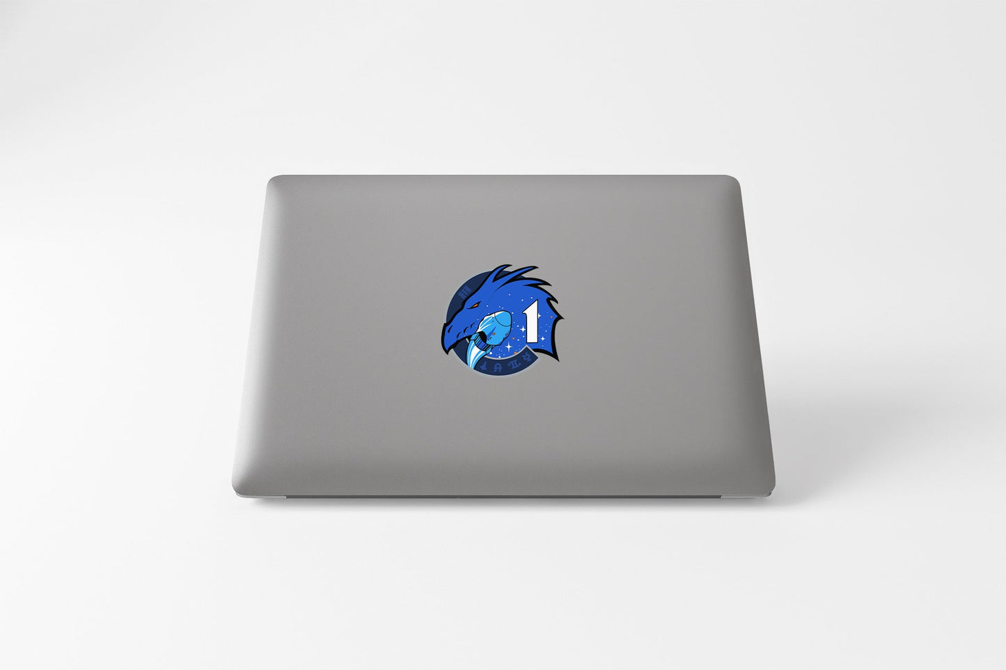a laptop with a blue fish on it