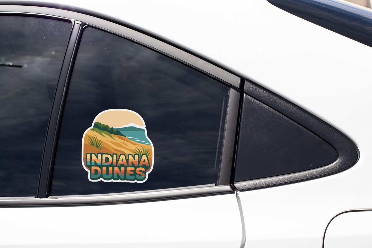 A sticker on the side of a car window that says "Indiana Dunes".