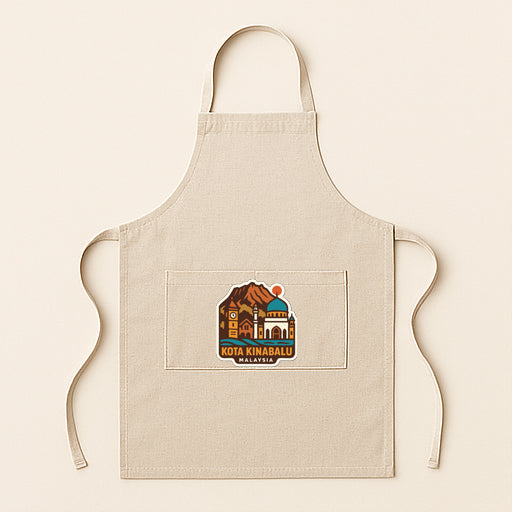 A beige apricot with a graphic design on the front pocket, featuring a mountain and a building.