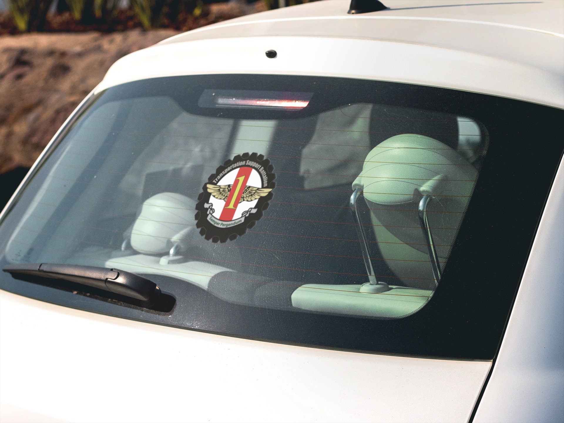 a car with a sticker on the back window