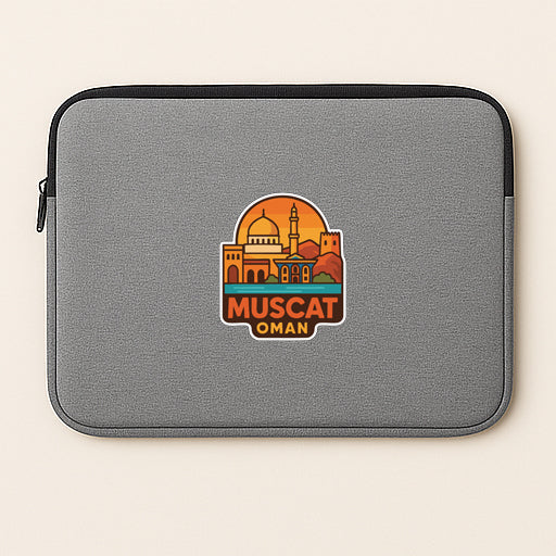 A gray laptop sleeve with a sticker depicting the city of Muscat, Oman.