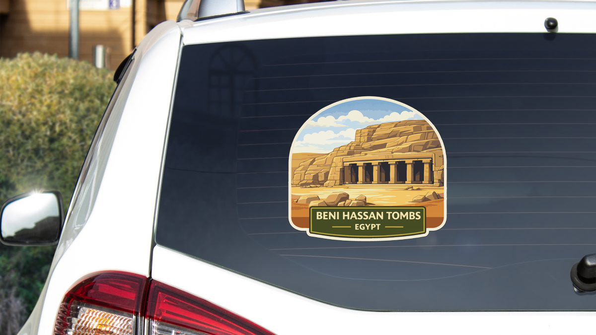 a sticker on the rear window of a car that displays the name of a tomb, Beni Hassan Tombs, and the country of Egypt.
