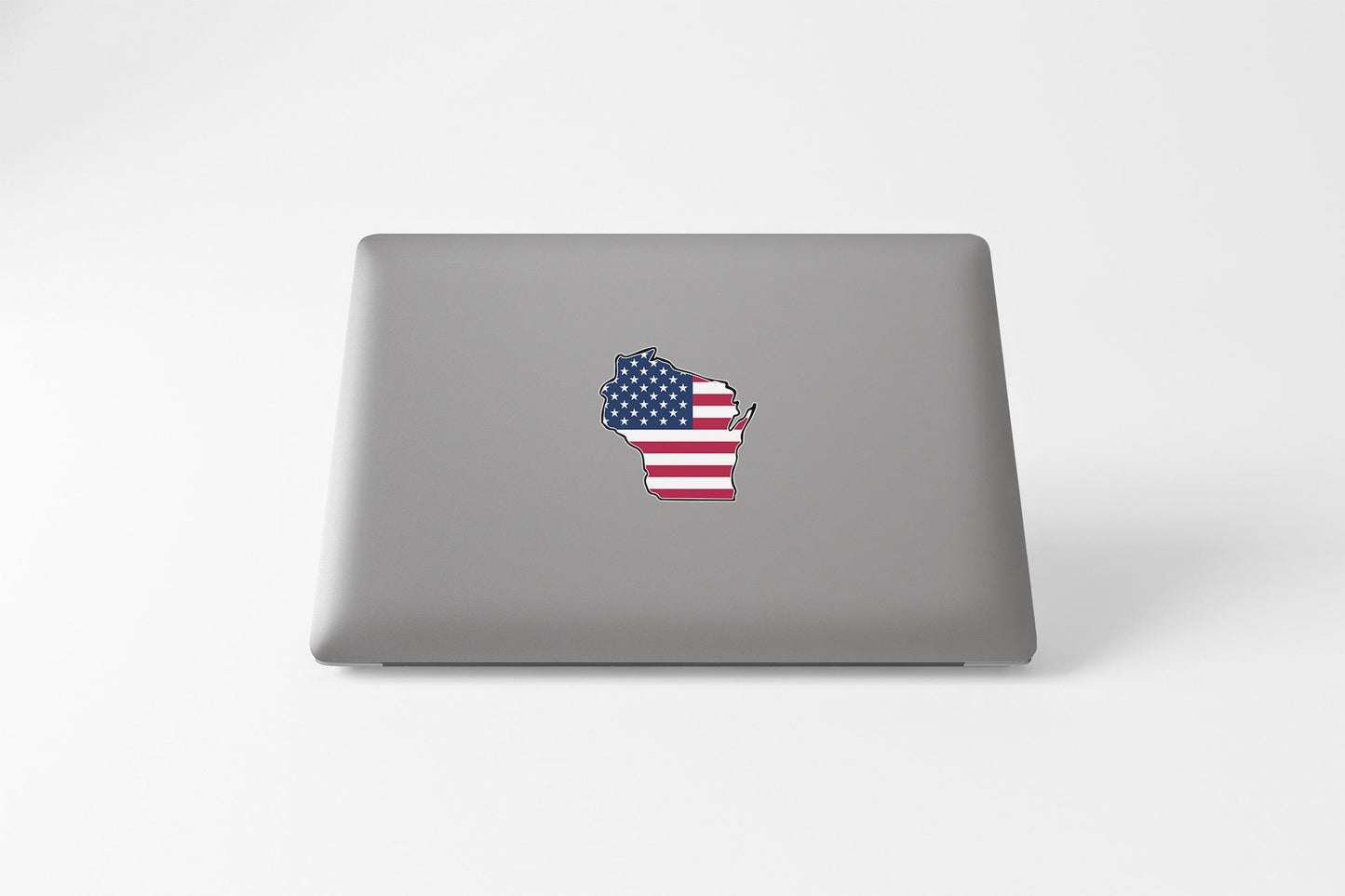 a laptop computer with a sticker of the american flag in the shape of a