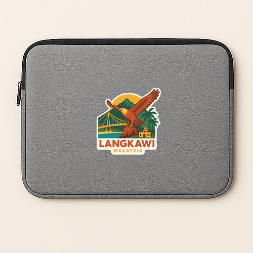 A gray laptop sleeve with a sticker depicting a bird of prey, likely an eagle, in flight over a scenic landscape with a bridge and mountains.