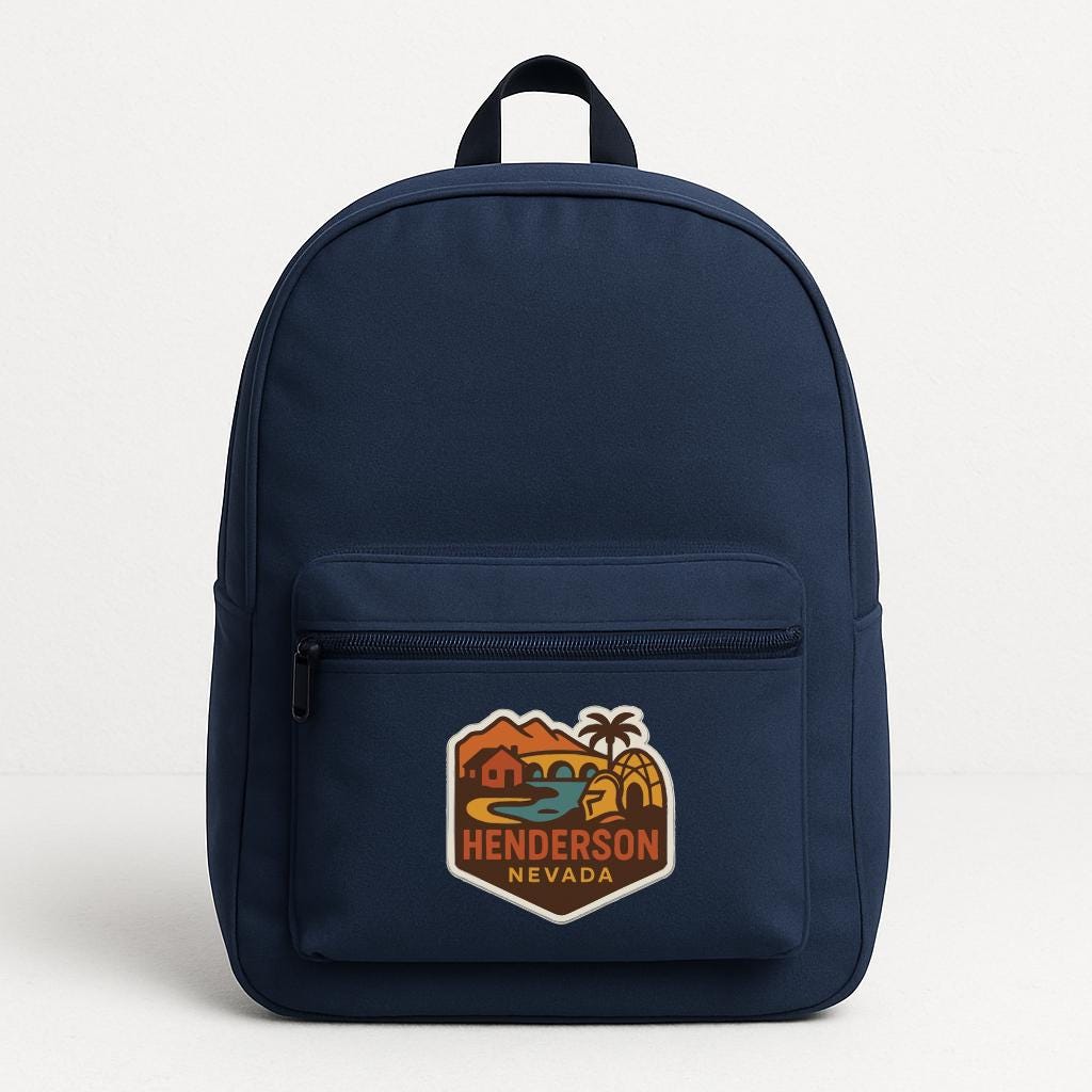 A navy blue backpack with a graphic of Henderson, Nevada on the front pocket.
