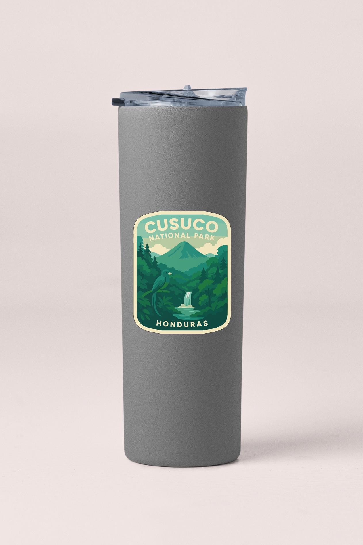 A gray insulated tumbler with a label that reads "CUSUCO NATIONAL PARK HONDURAS".