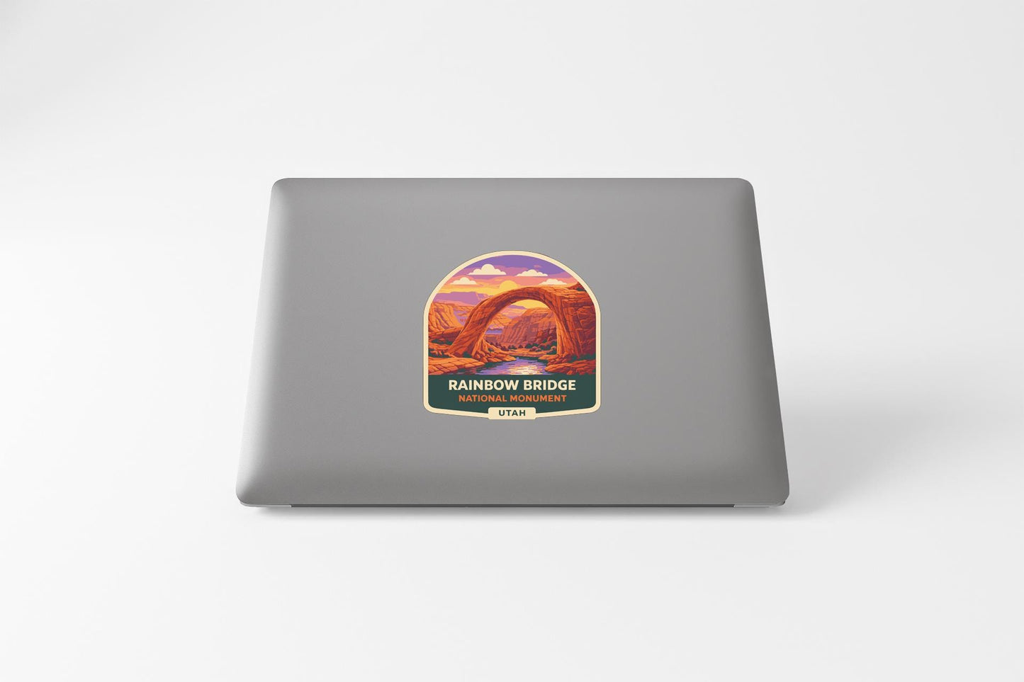 a sticker or label with a scenic illustration of the Rainbow Bridge in Utah.
