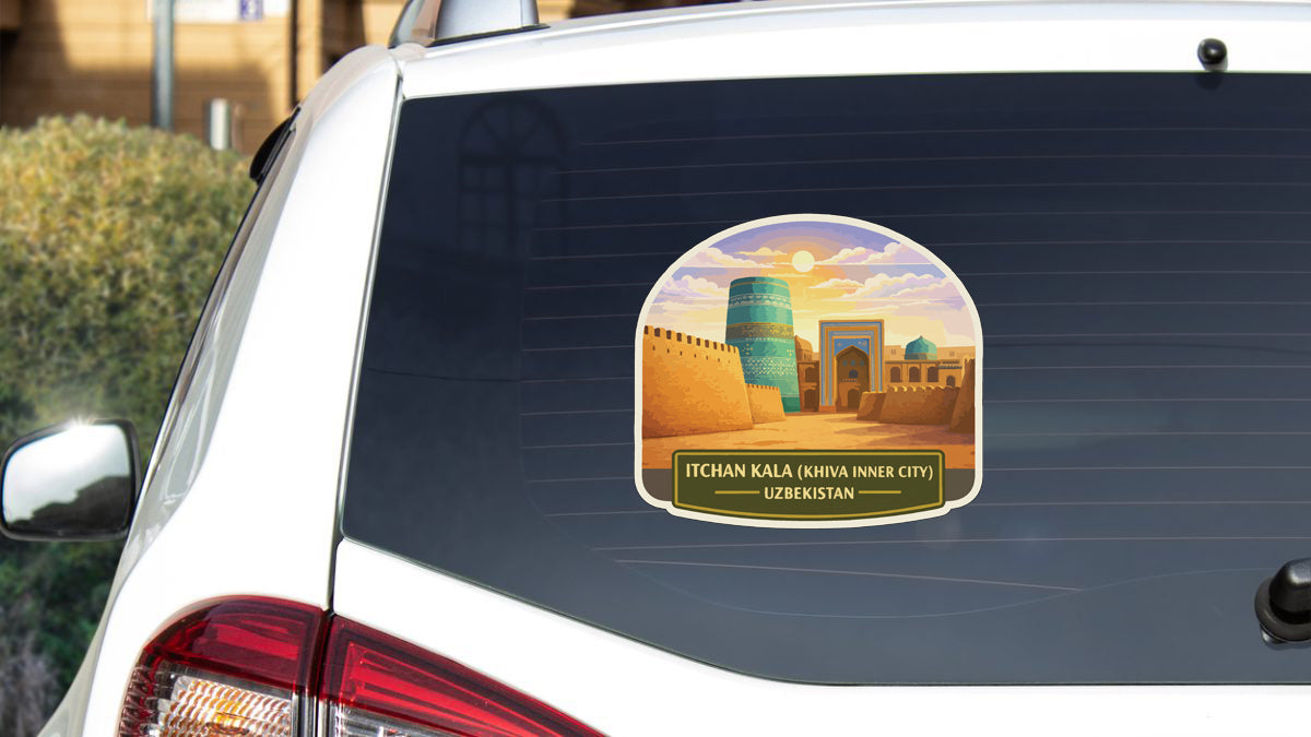 a sticker on the rear window of a car, depicting a cityscape with a prominent tower.