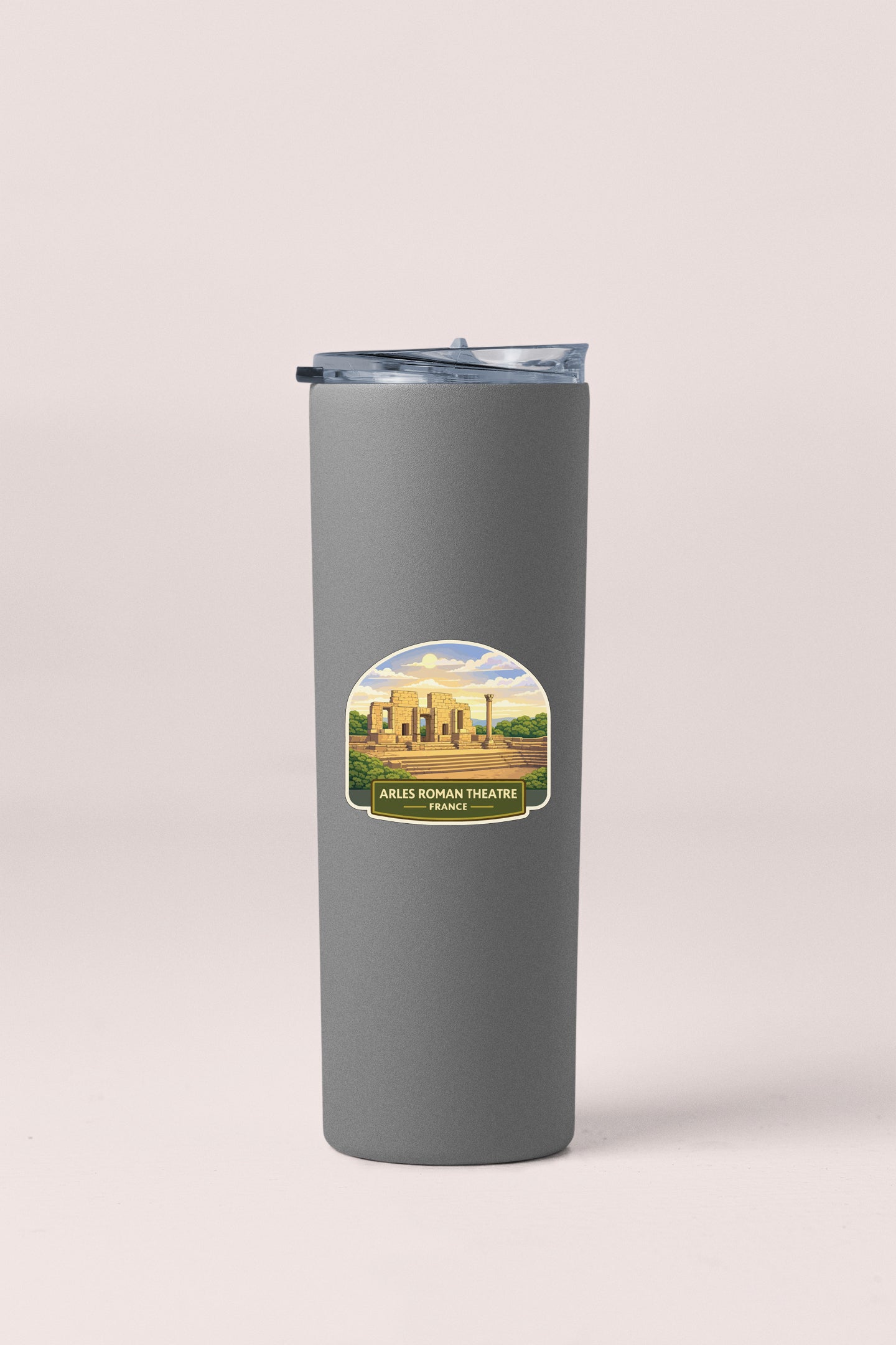 A gray cylindrical container with a lid and a label featuring an image of a building and text.