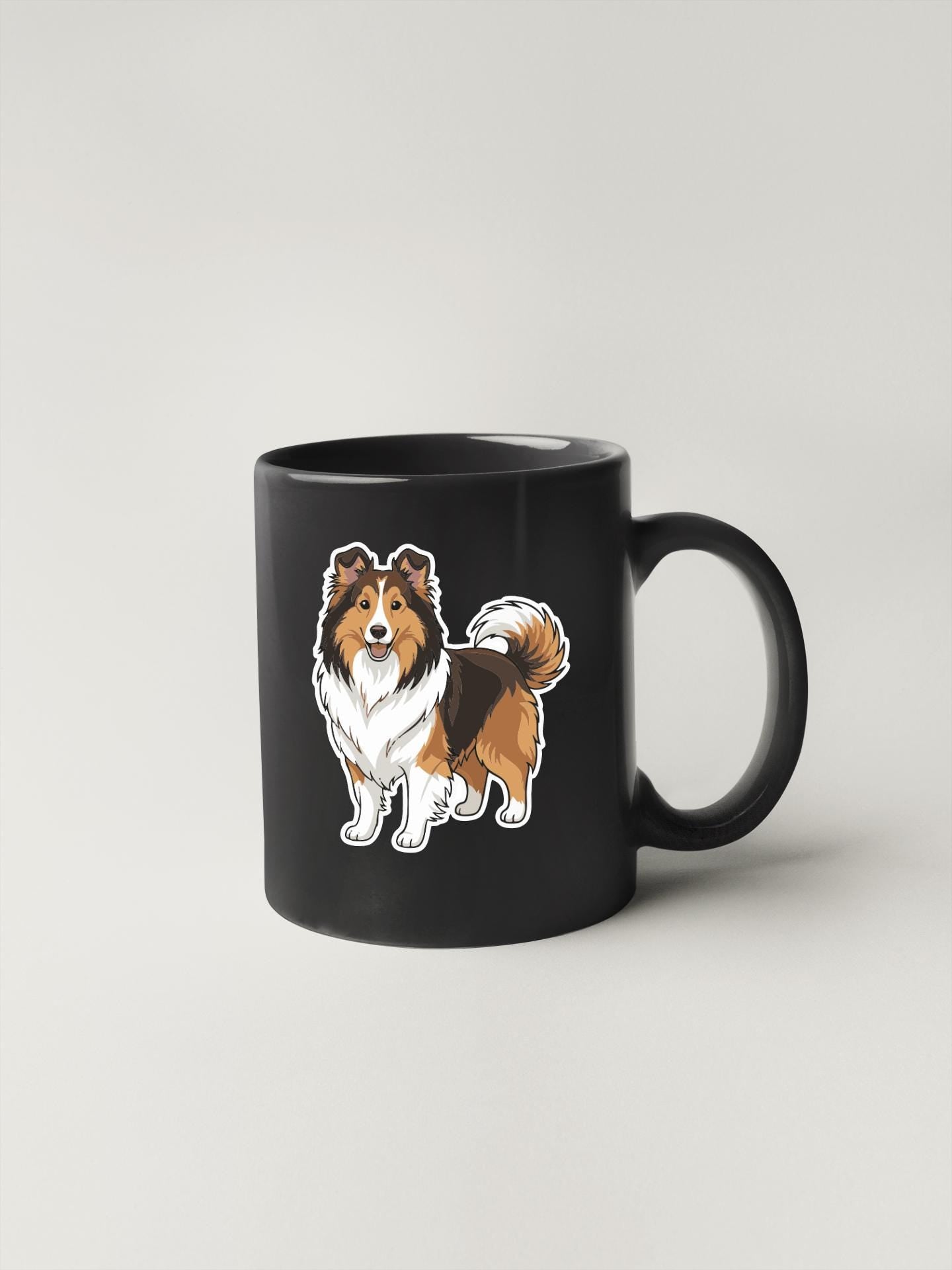 A black coffee mug with a cartoon illustration of a dog on it.