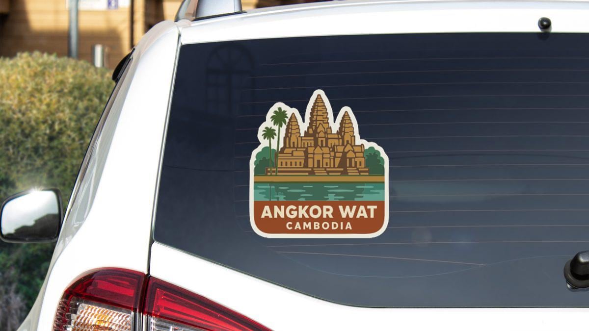 A sticker on the rear window of a car, depicting the Angkor Wat temple complex in Cambodia.