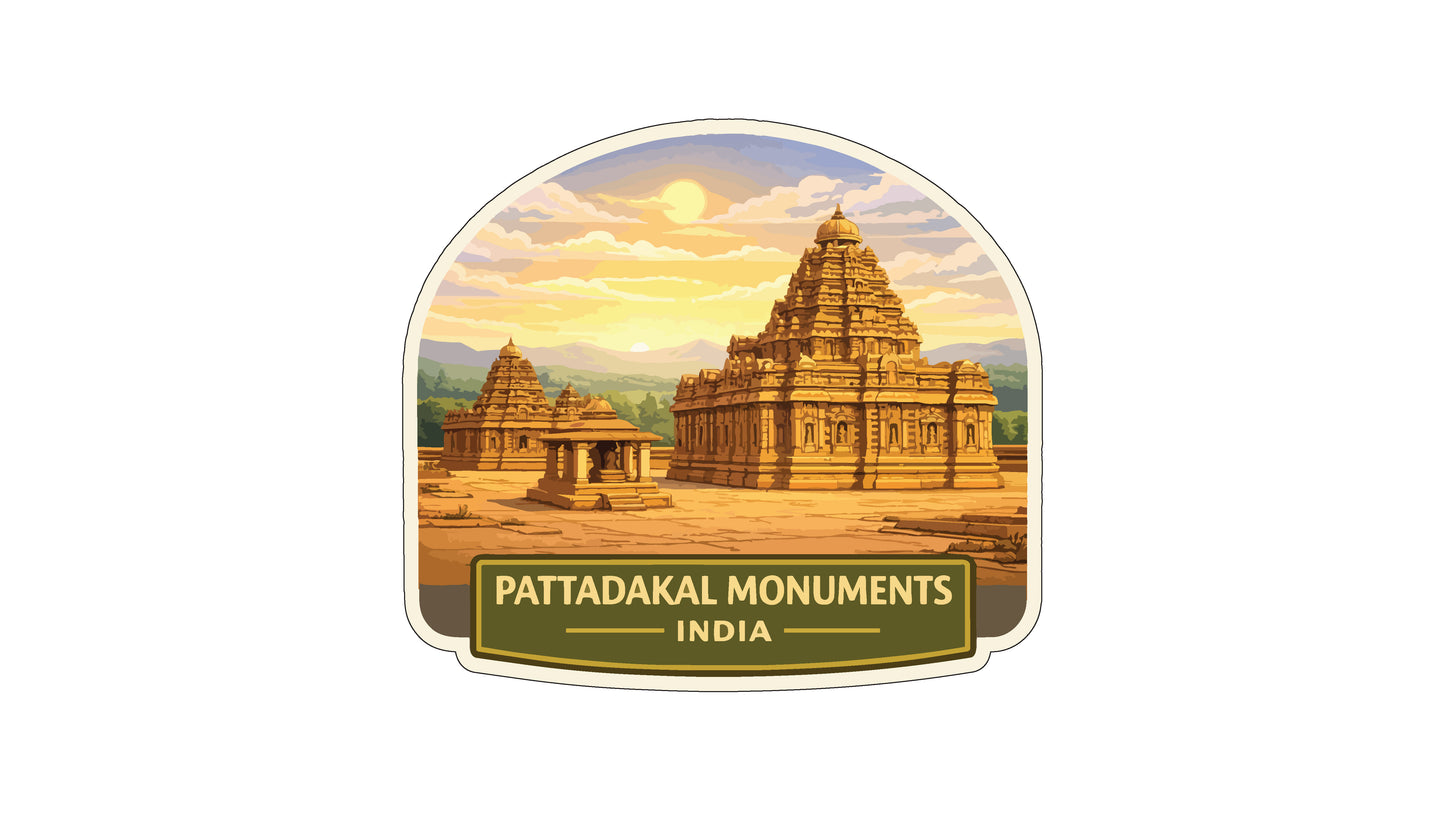 a large, ornate temple with multiple domes and towers, set against a backdrop of a cloudy sky and mountains. The text "PATTADAKAL MONUMENTS INDIA" is displayed prominently in the center of the image.