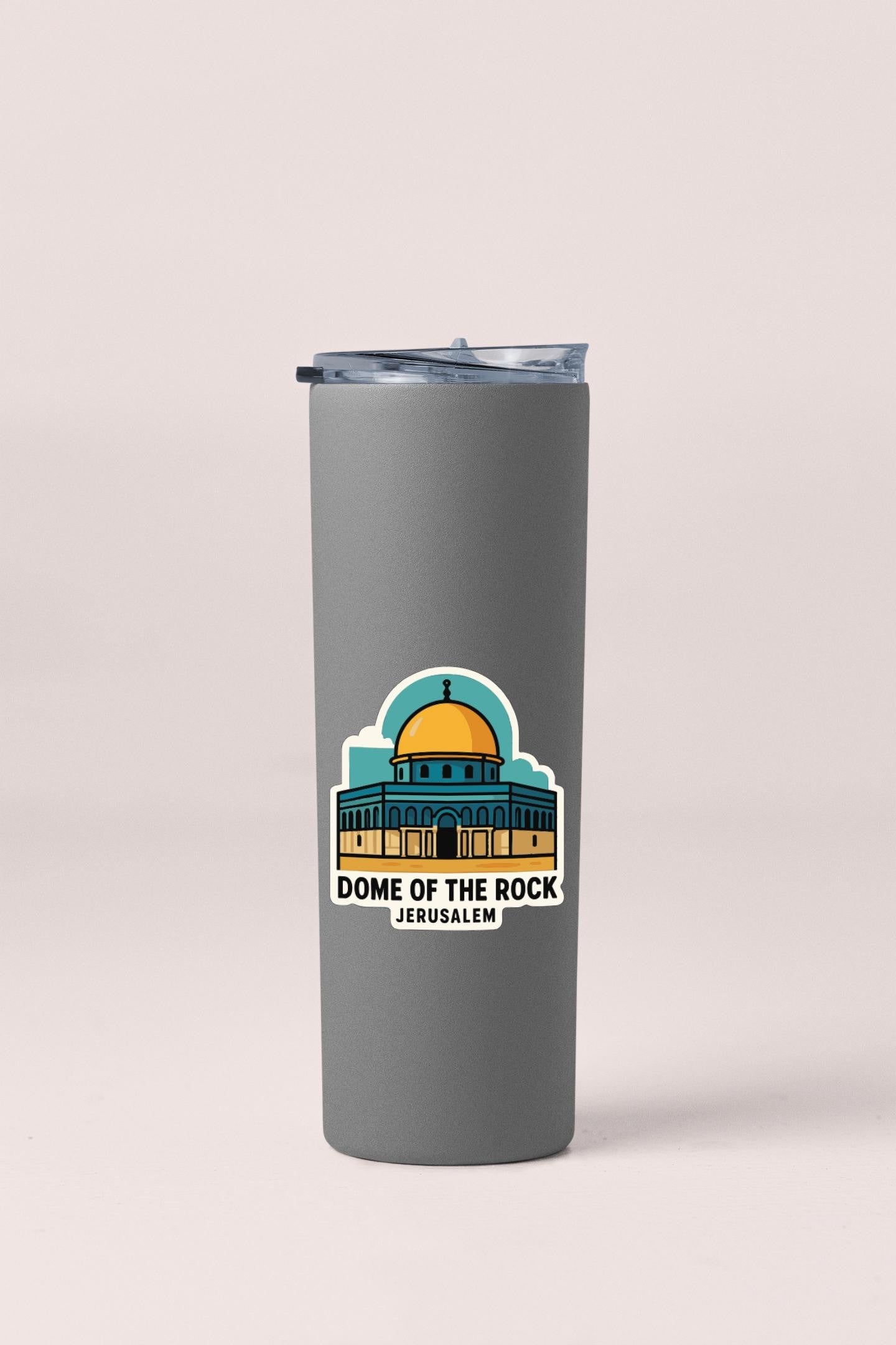 A gray insulated tumbler with a sticker depicting the Dome of the Rock in Jerusalem.