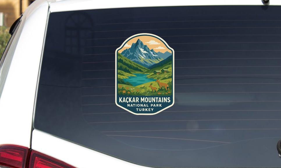 A sticker on the rear window of a vehicle that says "Kackar Mountains National Park Turkey".