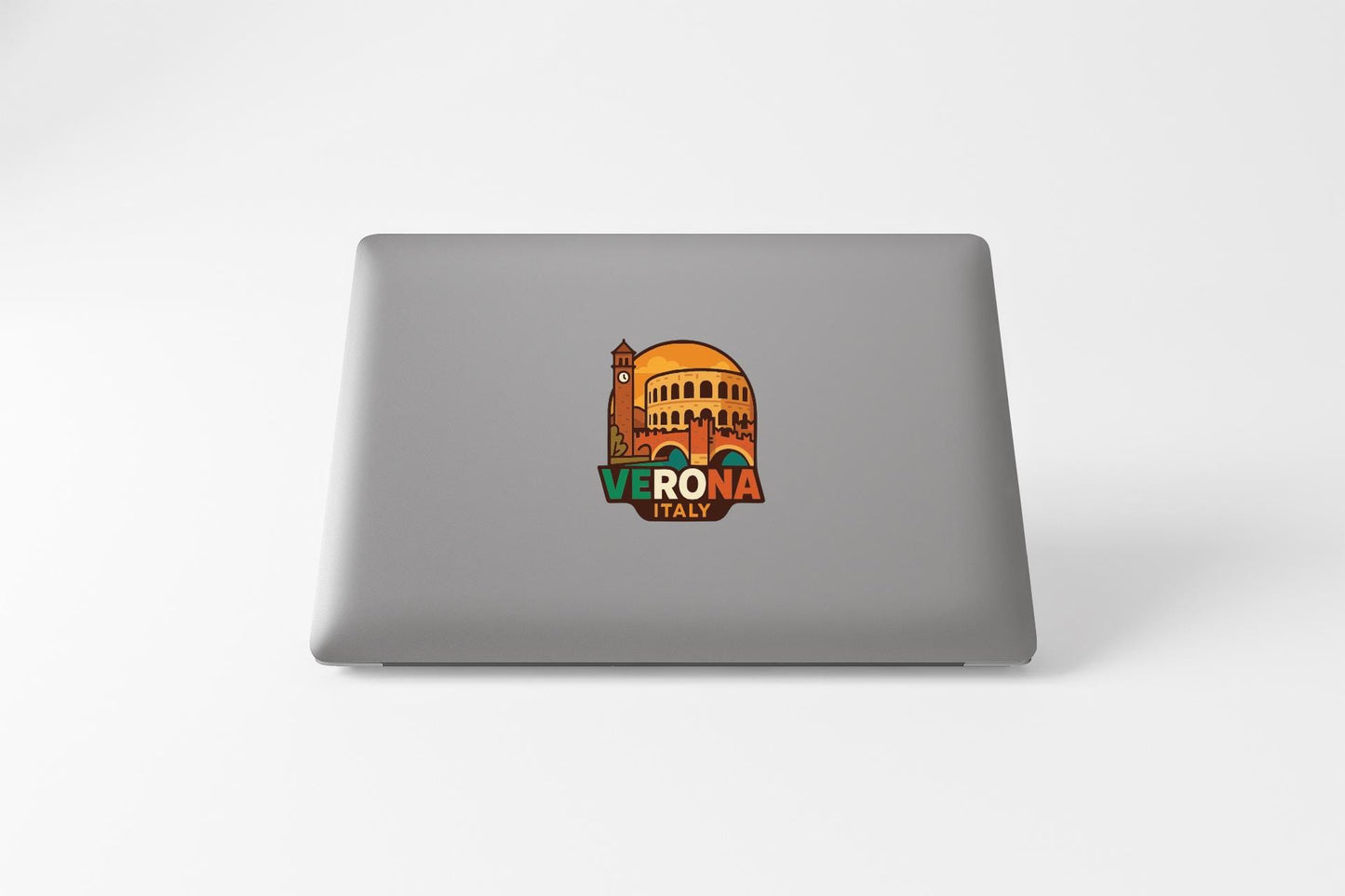 a sticker or decal of the city of Verona, Italy, on the back of a laptop computer.