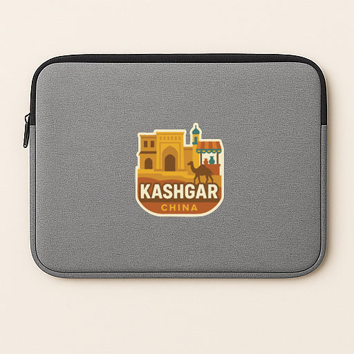 A gray laptop sleeve with a sticker depicting a cityscape and the text "Kashgar, China".