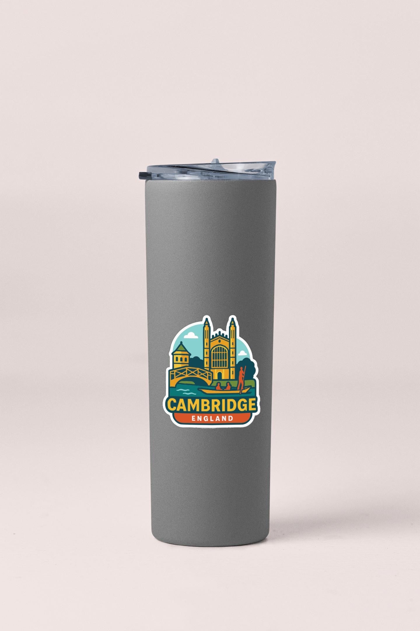 A gray insulated tumbler with a printed sticker depicting the iconic city of Cambridge, England.