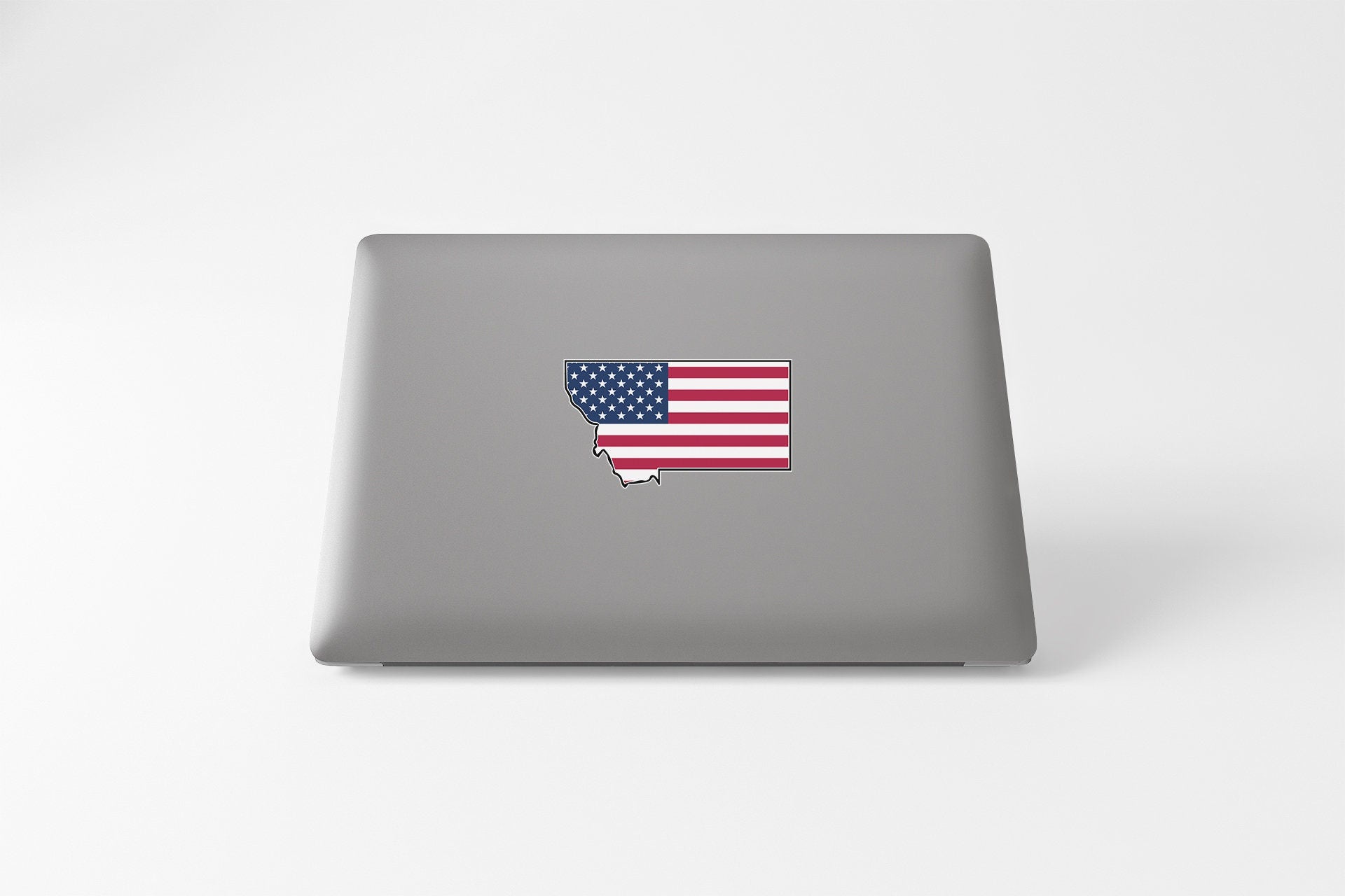 a laptop with a sticker of the state of indiana