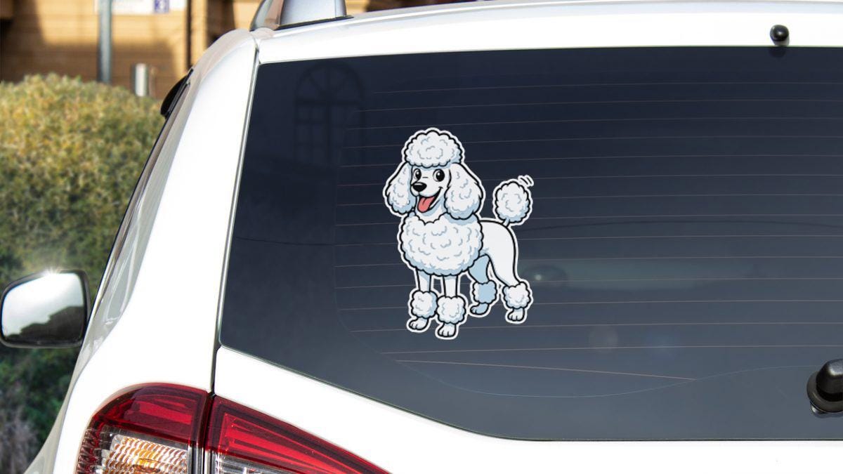 a white poodle sticker on the rear window of a car.