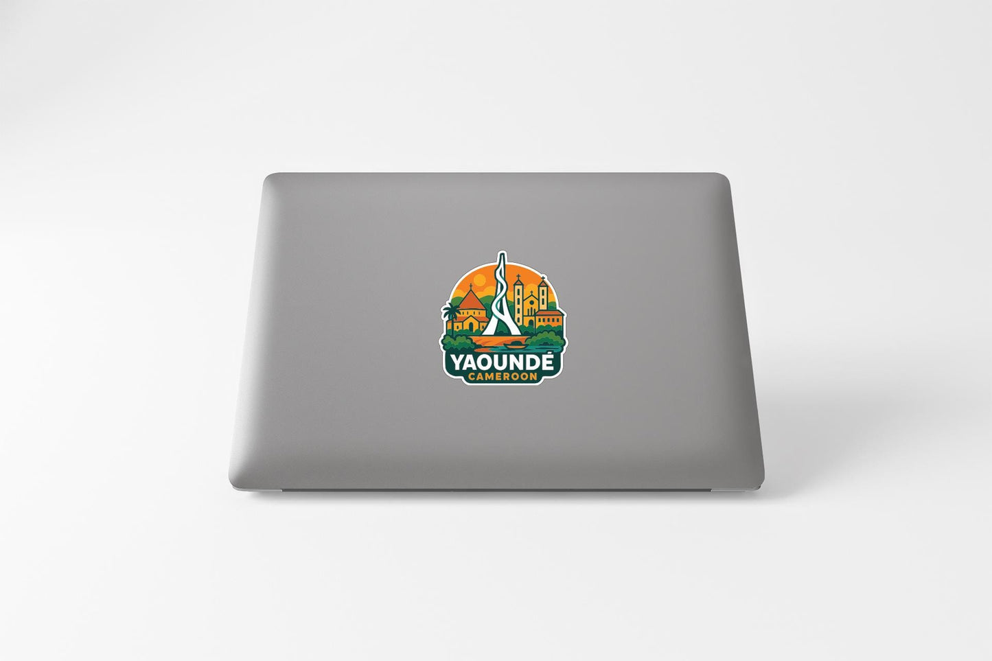 a sticker on the back of a laptop with a colorful design and text.