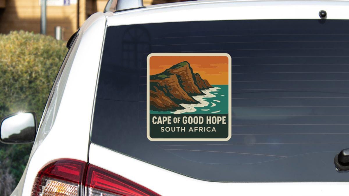 a sticker on the rear window of a car that says "Cape of Good Hope South Africa".