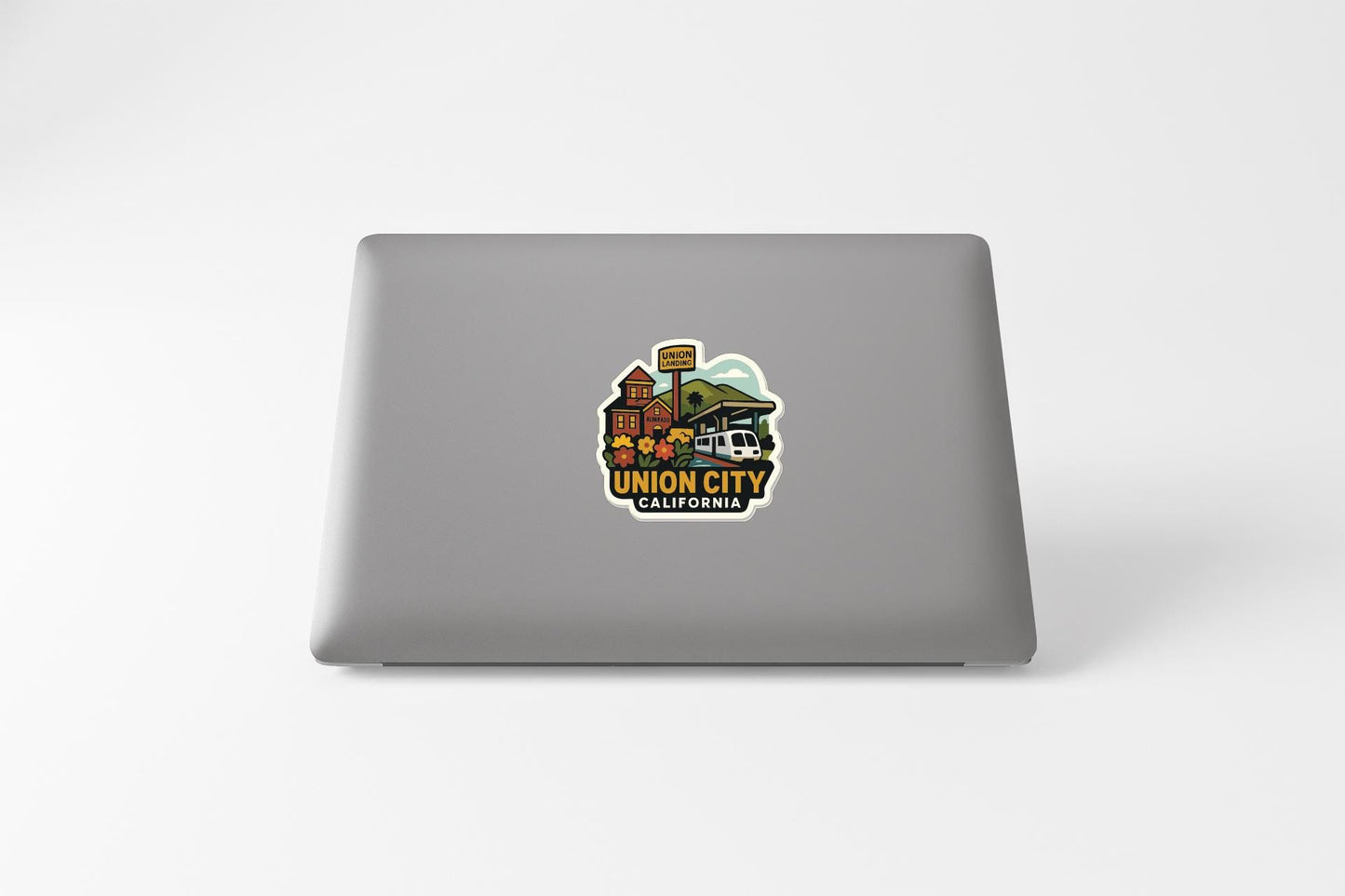 a sticker with a colorful illustration of a building and a sign that says "UNION CITY CALIFORNIA".