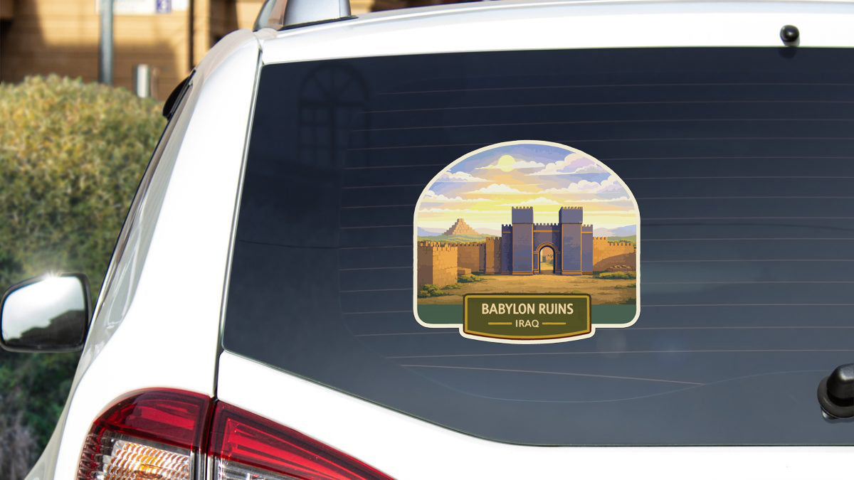 a sticker on the rear window of a car that depicts the ruins of Babylon, specifically the ancient city of Iraq.