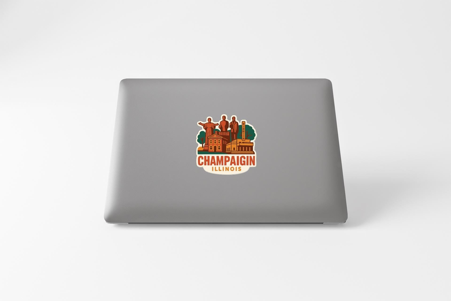 a sticker with the text "CHAMPIONGIN ILLINOIS" and an illustration of a cityscape.