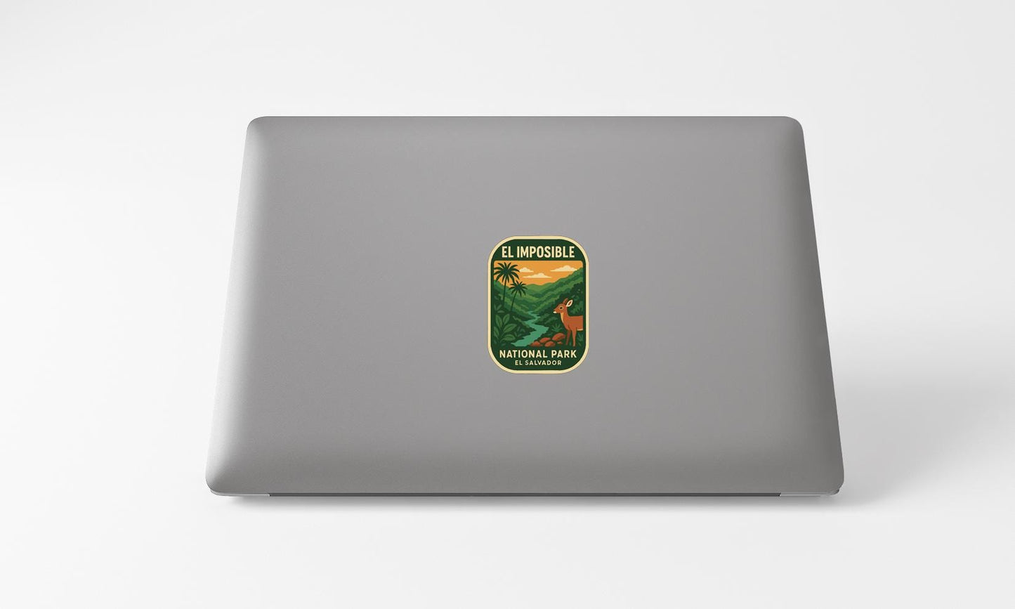 A sticker with the text "EL IMPOSIBLE NATIONAL PARK EL SALVADOR" printed on a grey laptop.