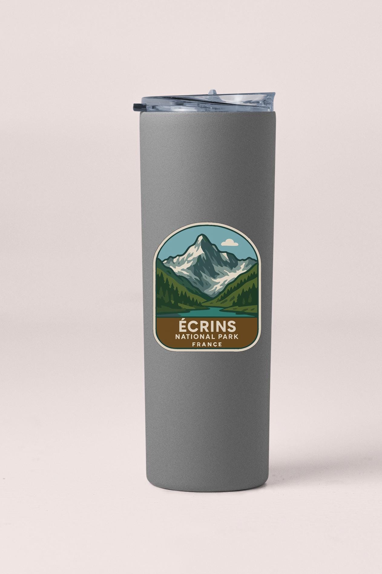 A gray insulated tumbler with a label that says "ECRINS NATIONAL PARK FRANCE".