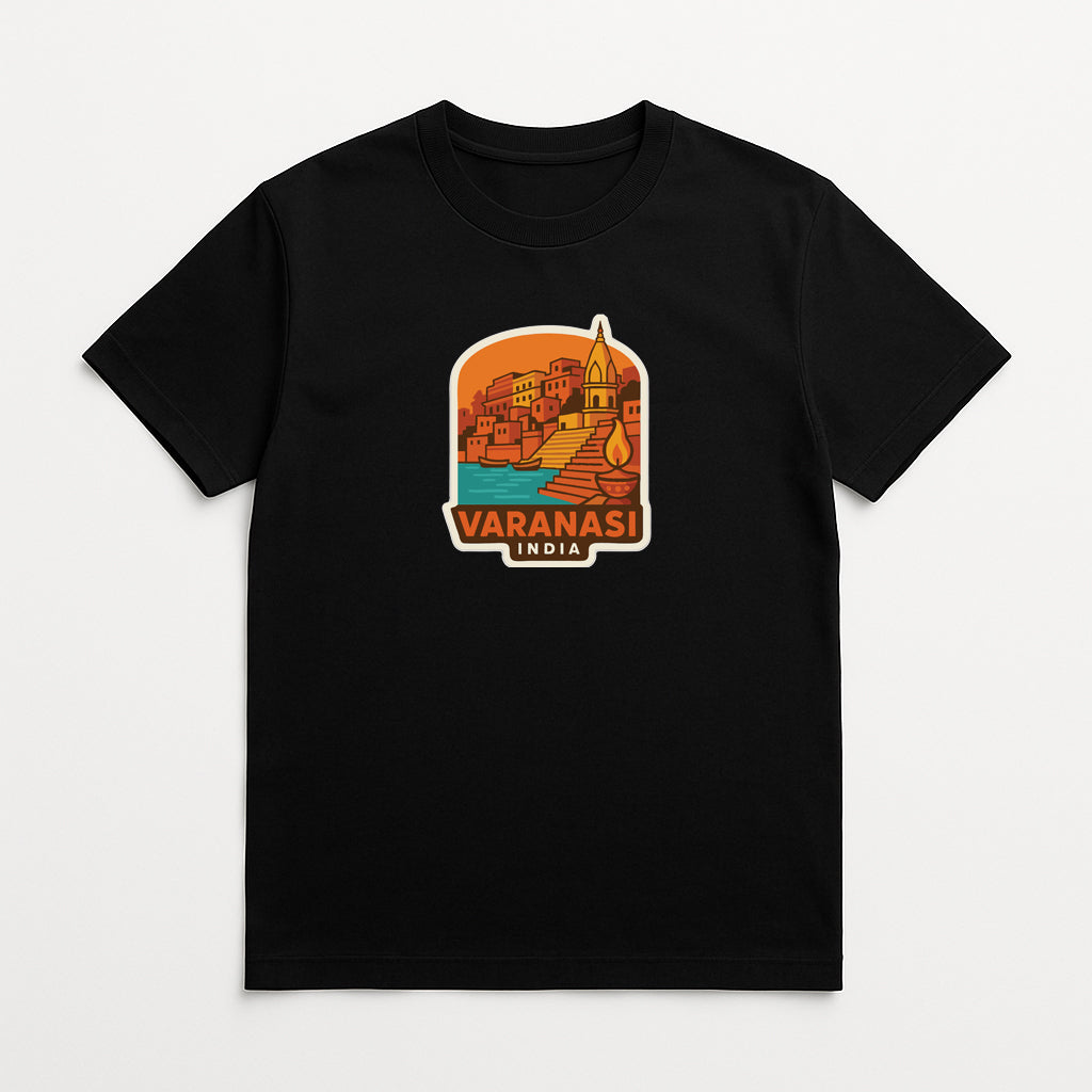 A black t-shirt with a graphic design depicting a cityscape and the text "VARANASI INDIA" printed on it.