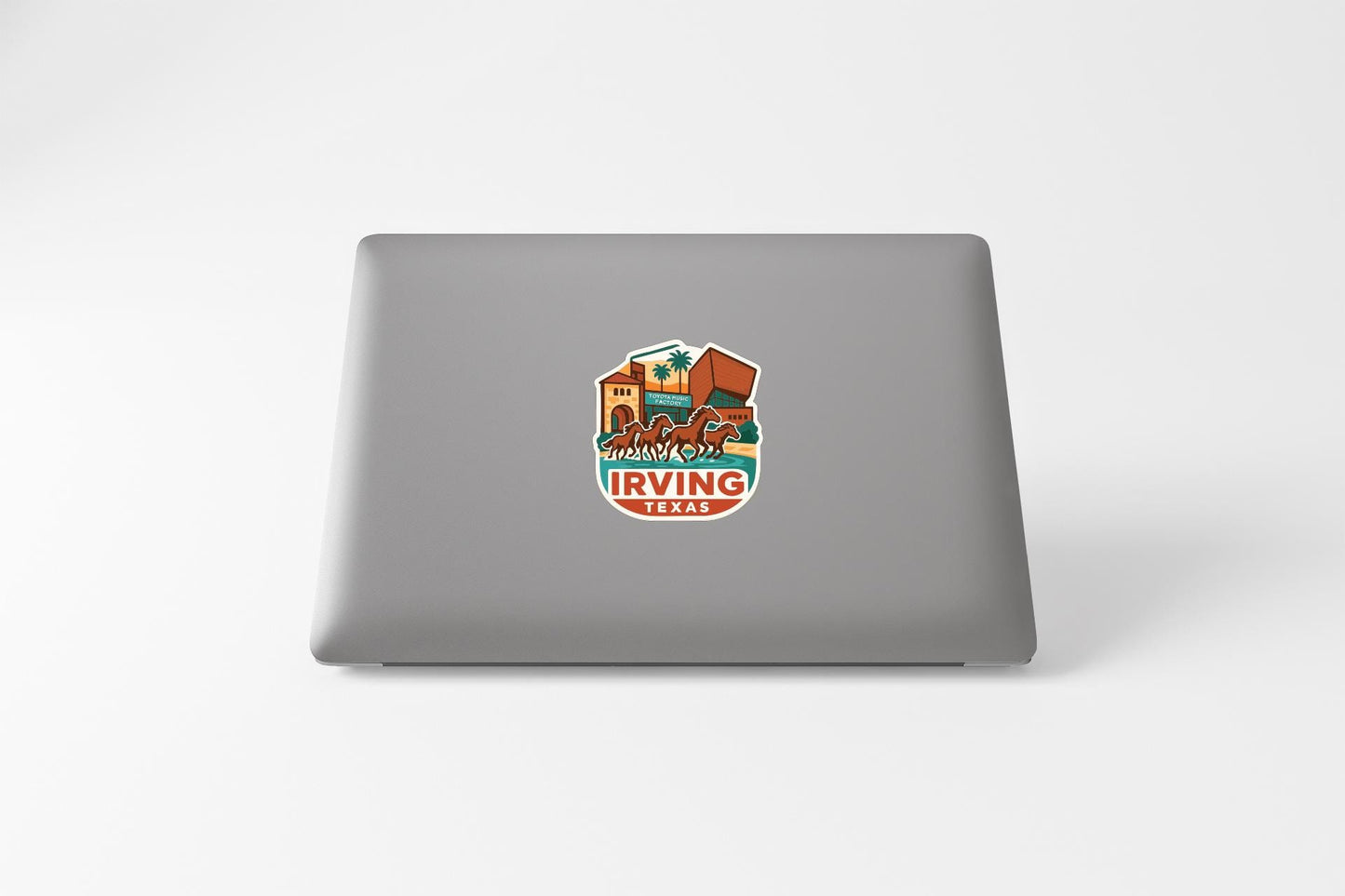 a sticker on the back of a laptop that says " Irving Texas".