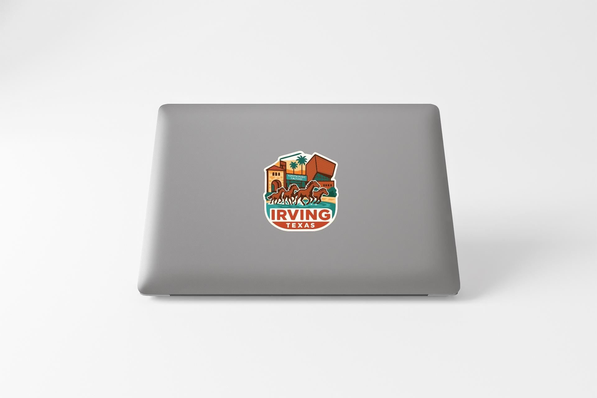 a sticker on the back of a laptop that says " Irving Texas".