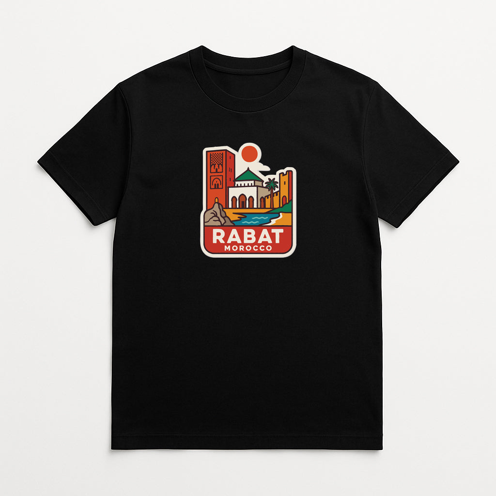 A black t-shirt with a graphic design depicting a cityscape and the text "RABAT MOROCCO" printed on it.