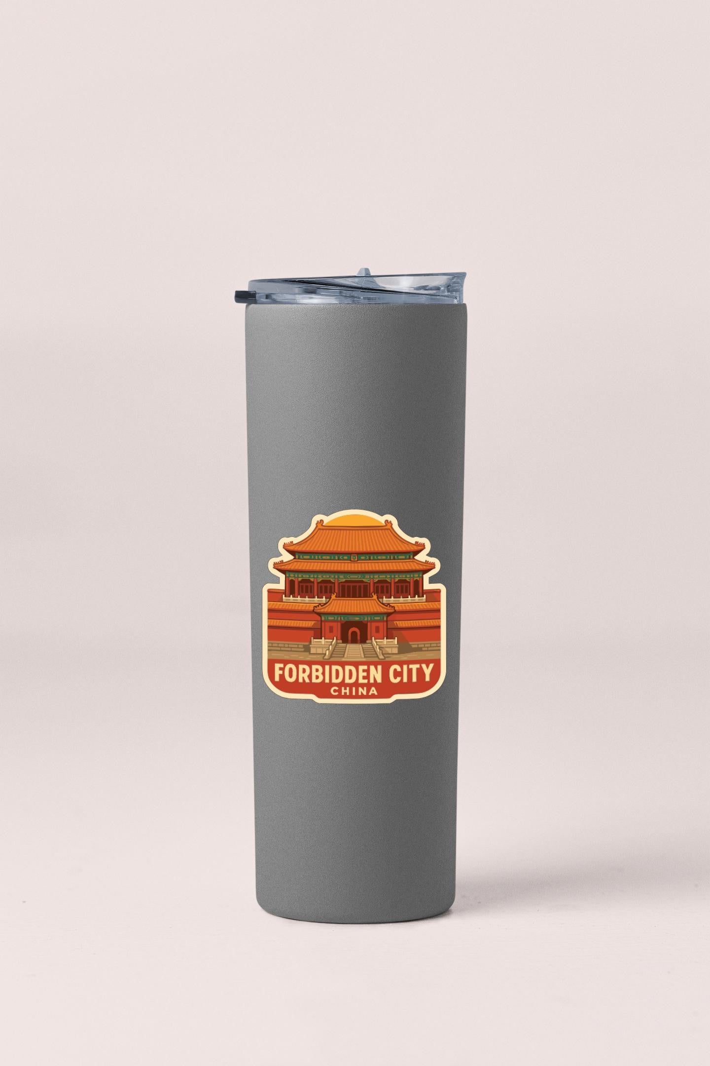 A gray insulated tumbler with a sticker depicting a Chinese temple.