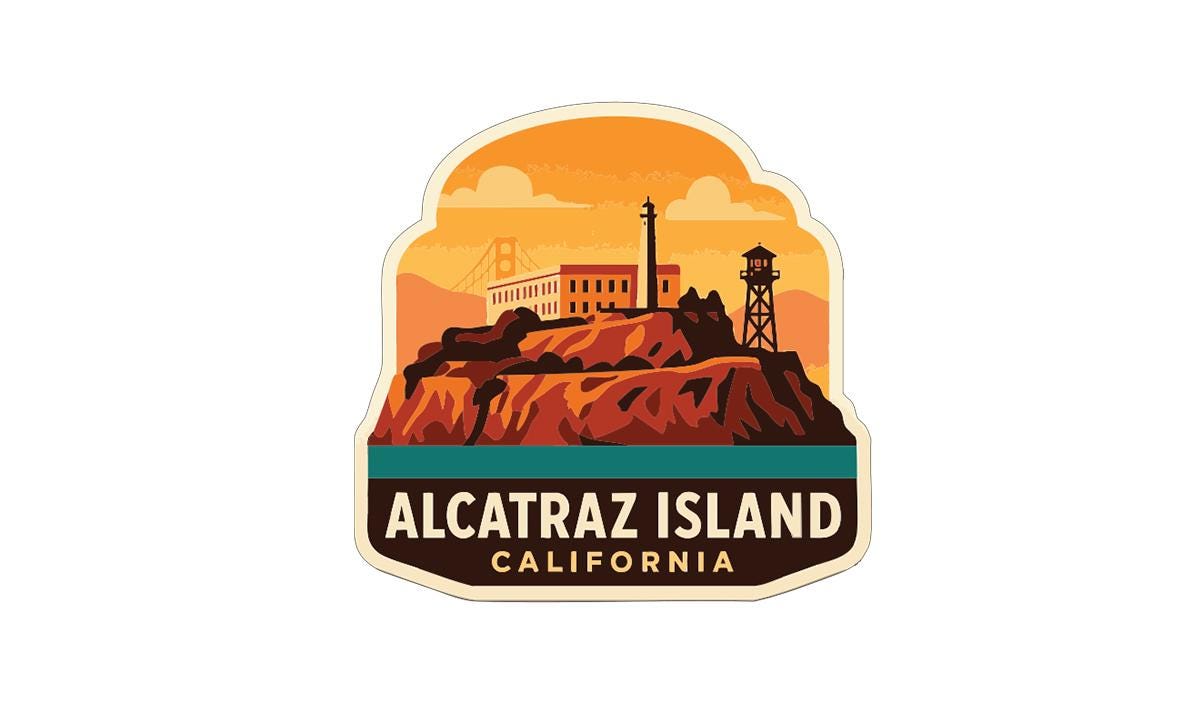 A sticker or label depicting the Alcatraz Island in California, with a lighthouse and a building on the hilltop against a sunset sky.