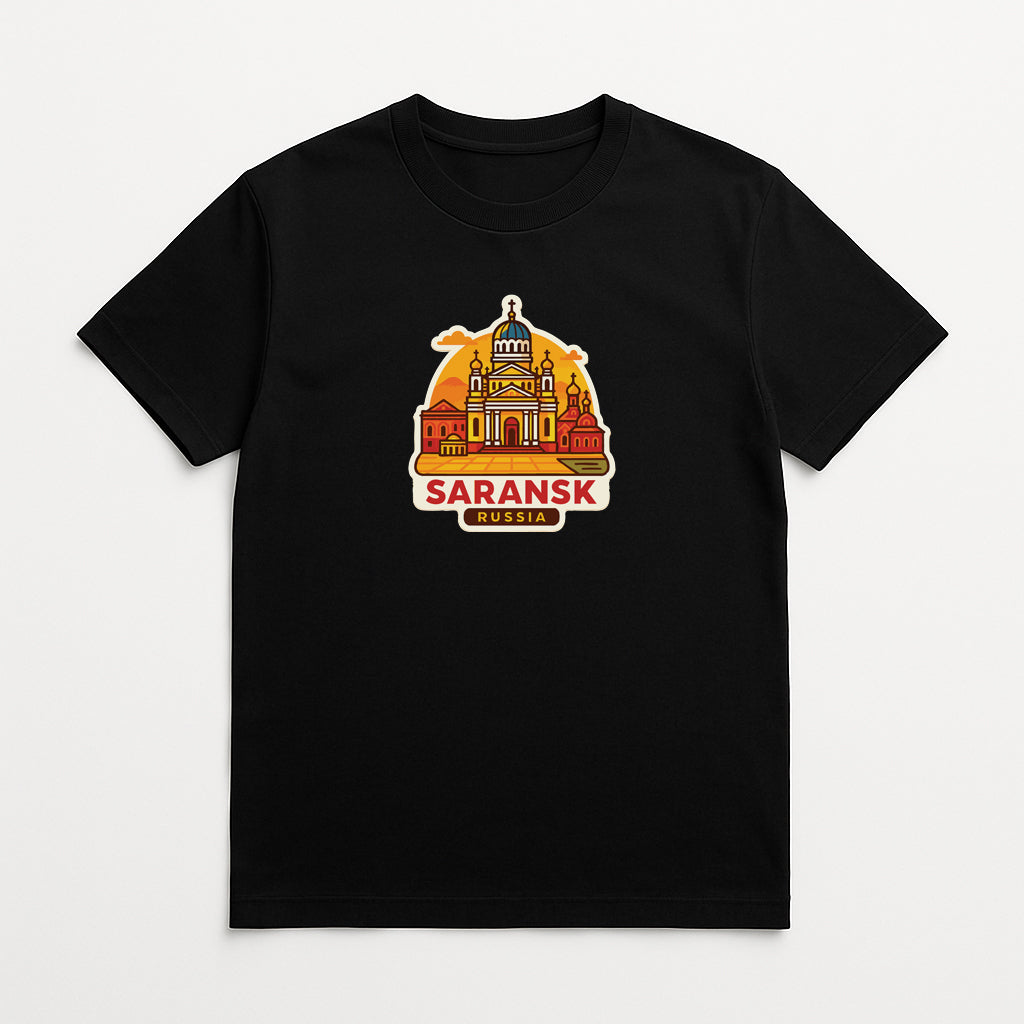 A black t-shirt with a graphic design depicting a city skyline, including a prominent building with a dome and a castle-like structure. The text "SARANSK" is displayed below the skyline, indicating the location of the city.