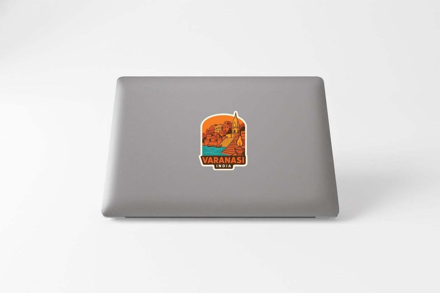 a sticker with an illustration of a landmark, specifically Varanasi, India.