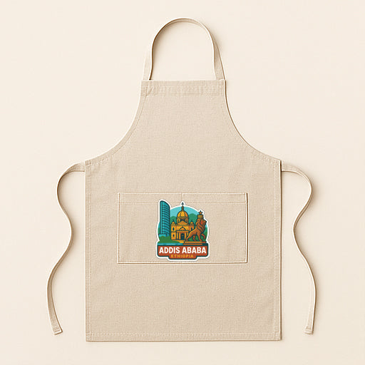 A beige apricot with a graphic of Addis Ababa on it, which is a city in Ethiopia.