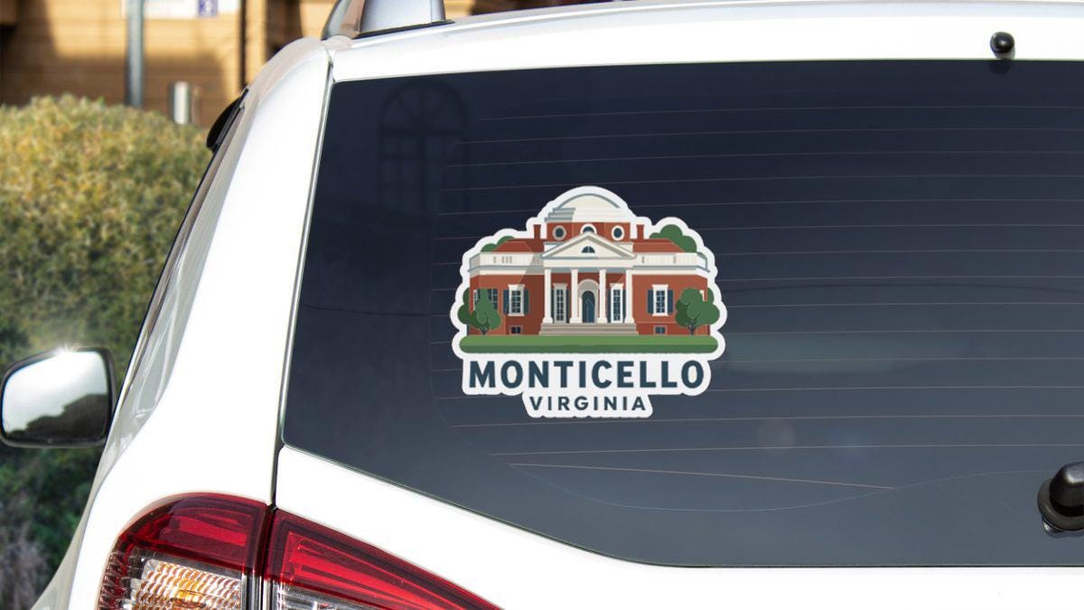 A sticker on the rear window of a white car, depicting a building with a dome, representing the Monticello, Virginia, university.