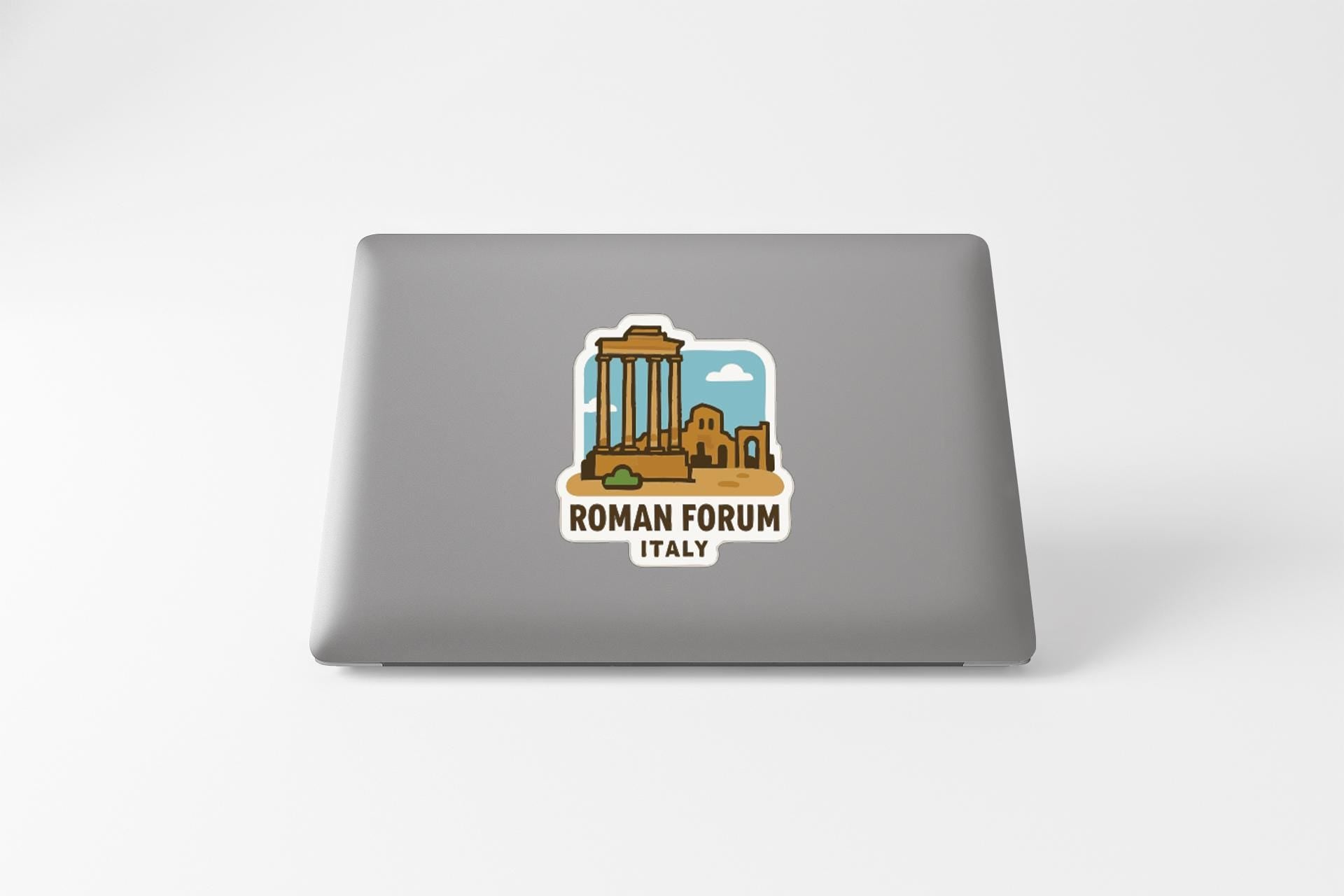 a sticker or decal on the back of a laptop, depicting a Roman Forum in Italy.