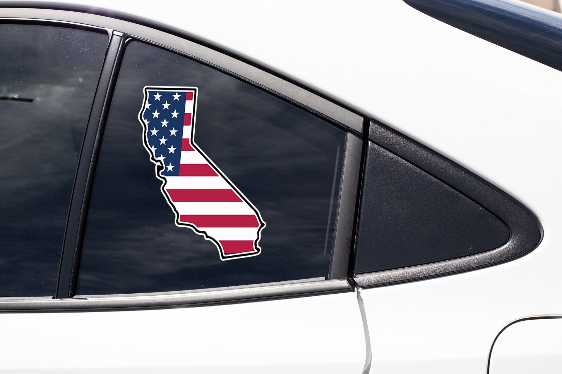 a car with a sticker of the state of california on it
