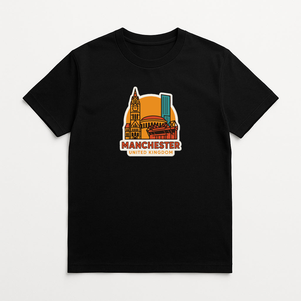 A black t-shirt with a graphic design depicting the skyline of Manchester, United Kingdom.