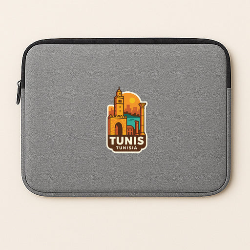 A gray laptop sleeve with a colorful graphic of a building and the text "TUNIS TUNISIA" printed on it.