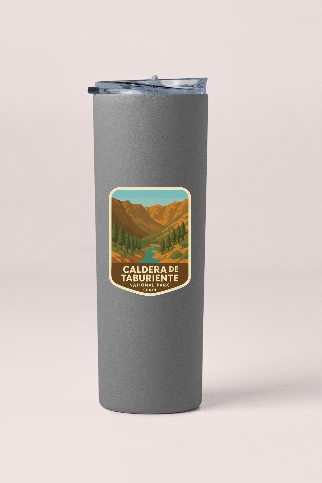 A gray insulated tumbler with a label that says "CALDERERA DE TABURIENTE NACIONAL PARK, SPAIN".
