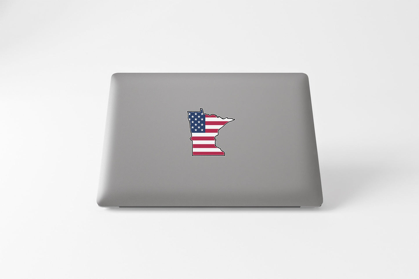 a laptop with a sticker of the state of minnesota