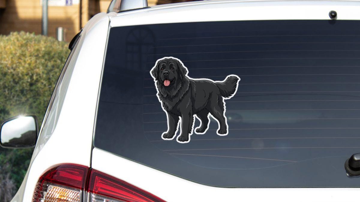 a sticker of a black dog on the rear window of a white car.
