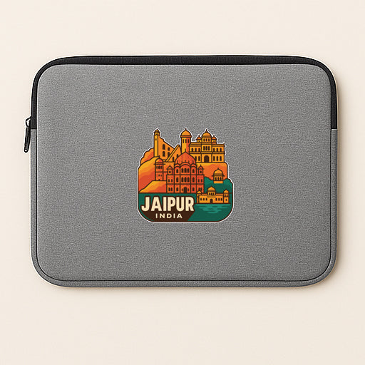 a gray laptop sleeve with a colorful graphic of the city of Jaipur, India, printed on it.