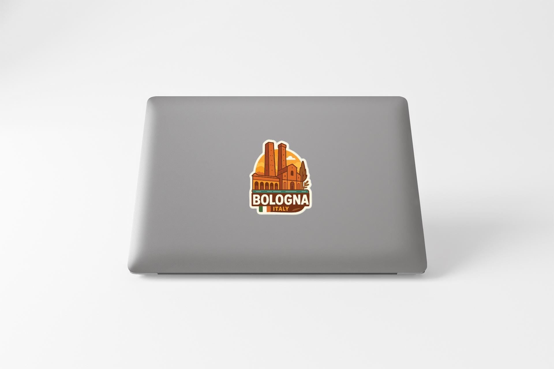 a sticker of Bologna, Italy, on the back of a laptop.